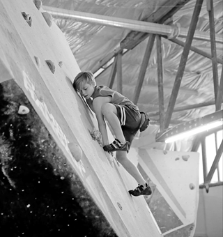 Junior climber on a slab