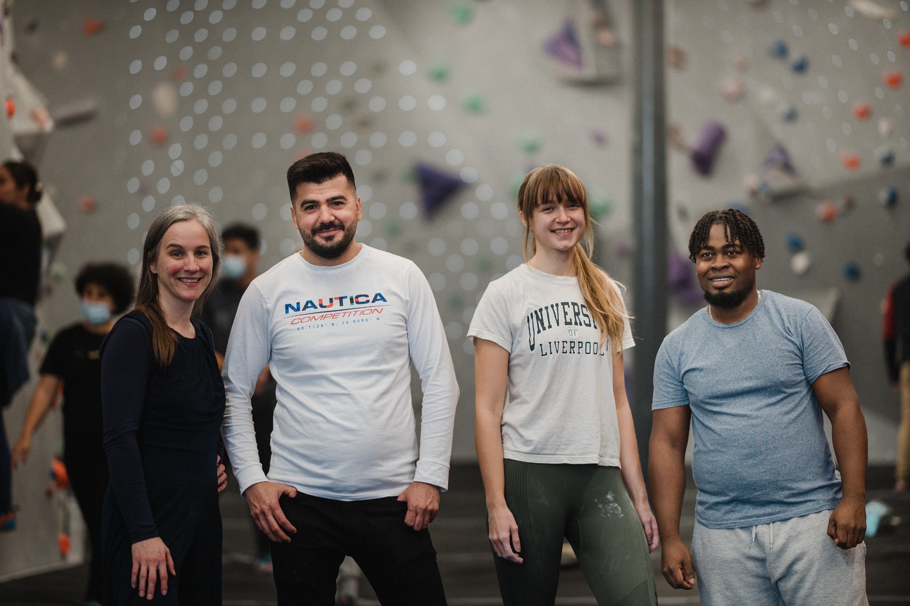 Participants and boulder buddies at a Refugees Rock session in Liverpool